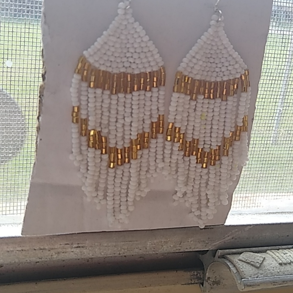 Gold and white earrings